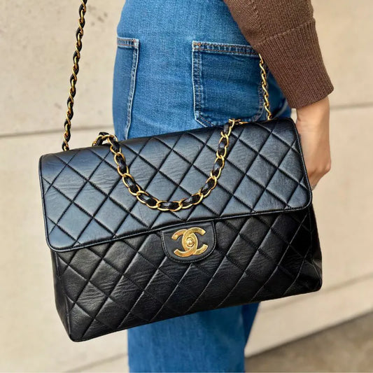 jah194-chanel-vintage-black-lambskin-jumbo-classic-flap-bag