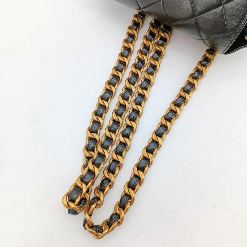 ju375-chanel-vintage-black-lambskin-duma-backpack