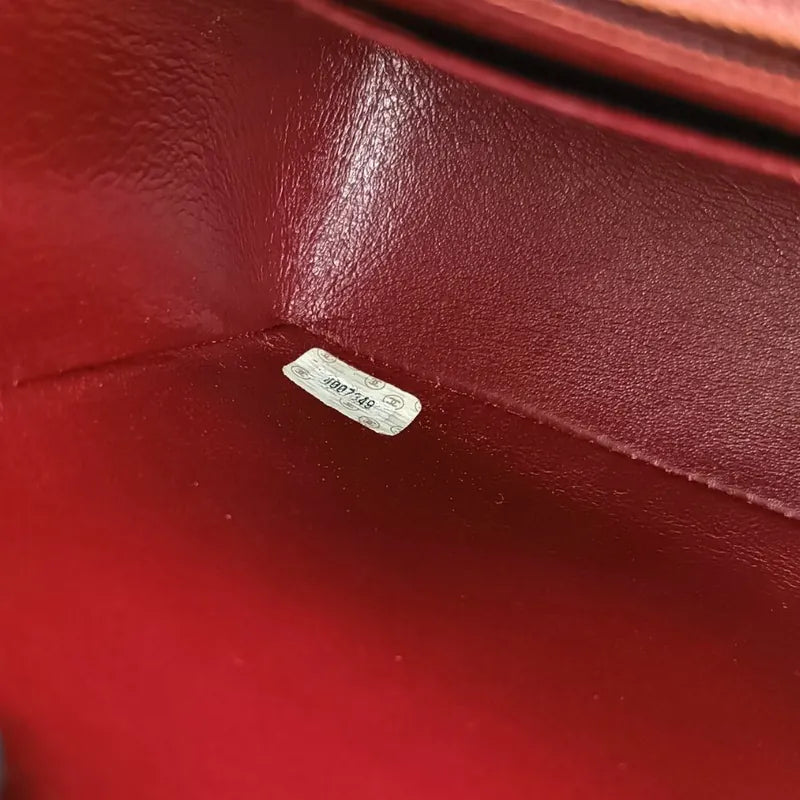 90201267-chanel-vintage-black-lambskin-quilted-flap-bag