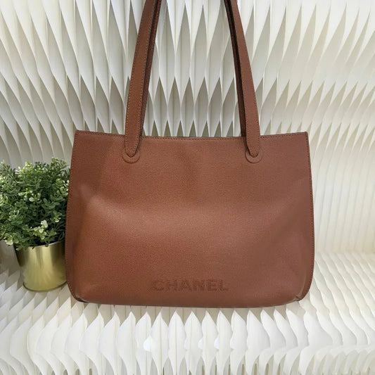 ju293-chanel-vintage-brown-caviar-leather-embroidered-logo-tote-bag