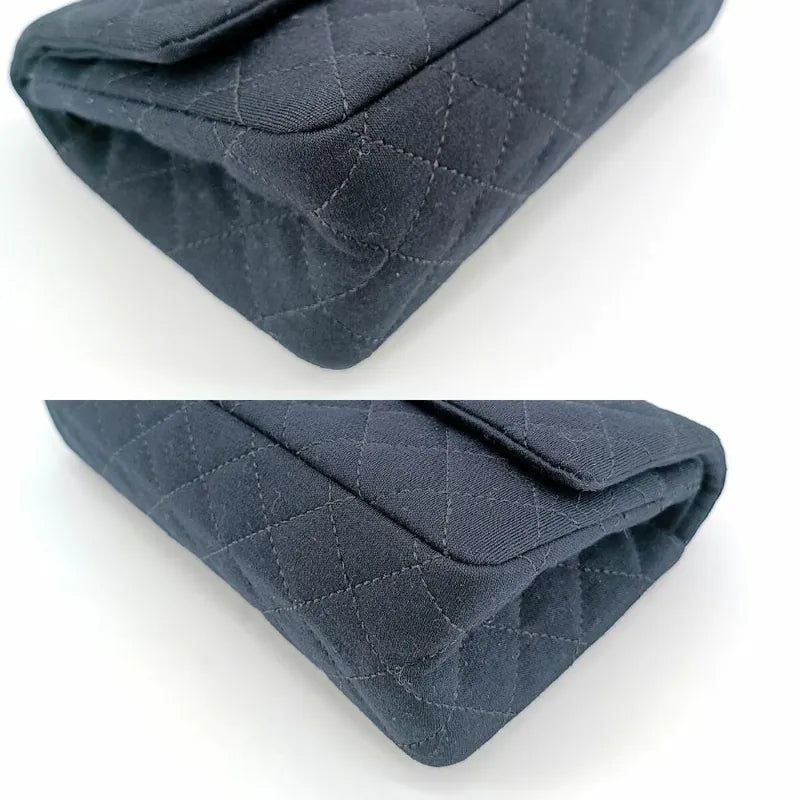 90196140-chanel-vintage-black-cotton-255-rhinestone-flap-bag