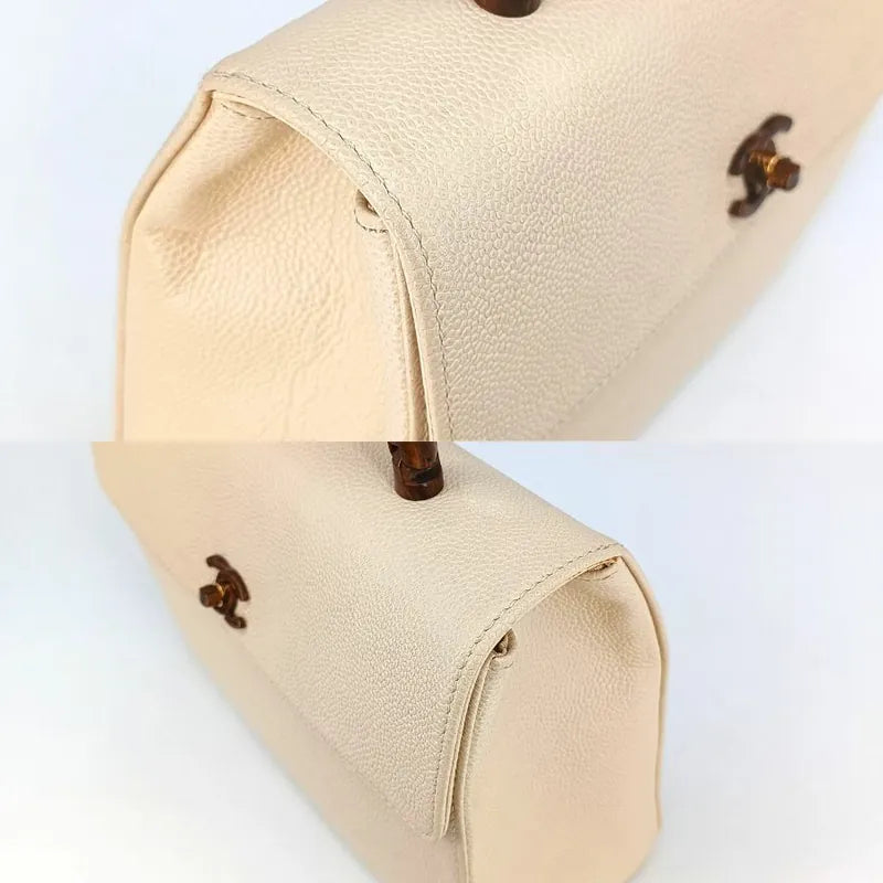 90198834-chanel-vintage-white-caviar-leather-wood-top-handle-bag