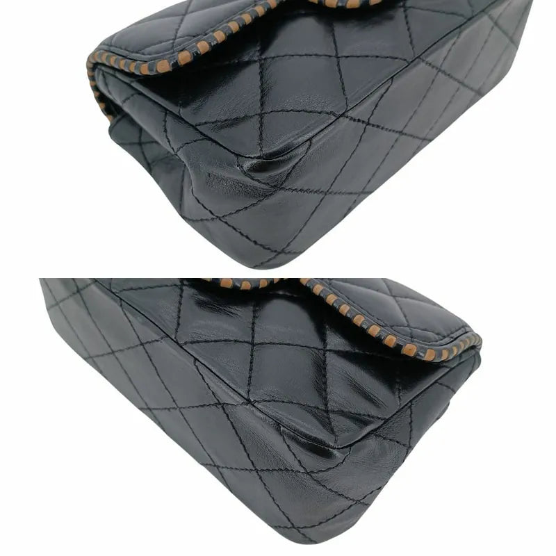 ju307-chanel-vintage-black-lambskin-flap-bag