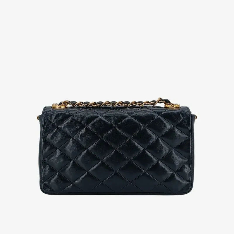 ra104-chanel-vintage-black-lambskin-pointed-flap-bag