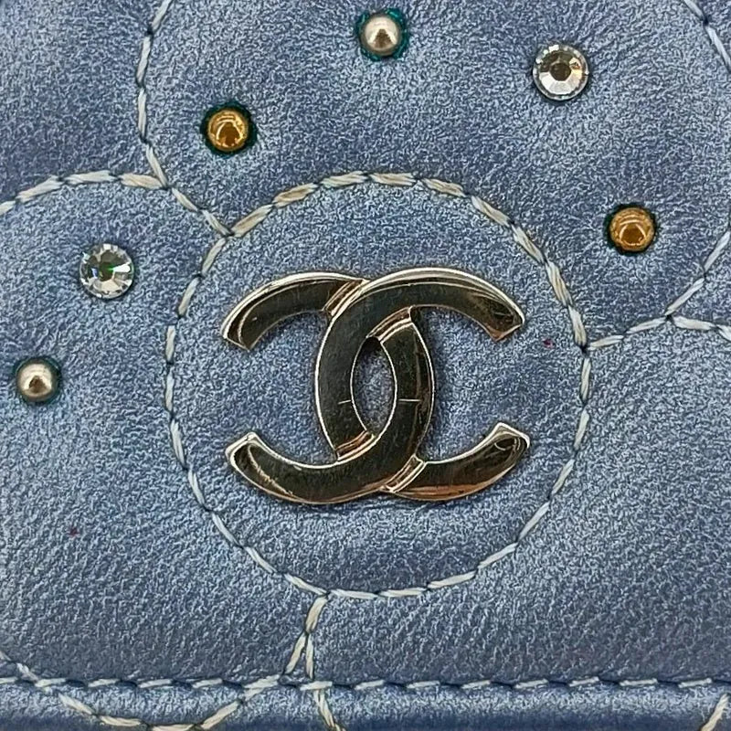 c484-chanel-light-blue-calfskin-camellia-studded-wallet-on-chain