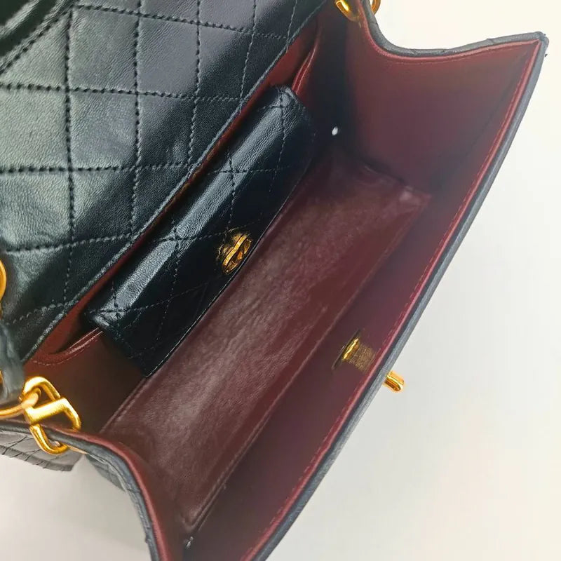 ju308-chanel-vintage-black-lambskin-trapezoid-flap-bag