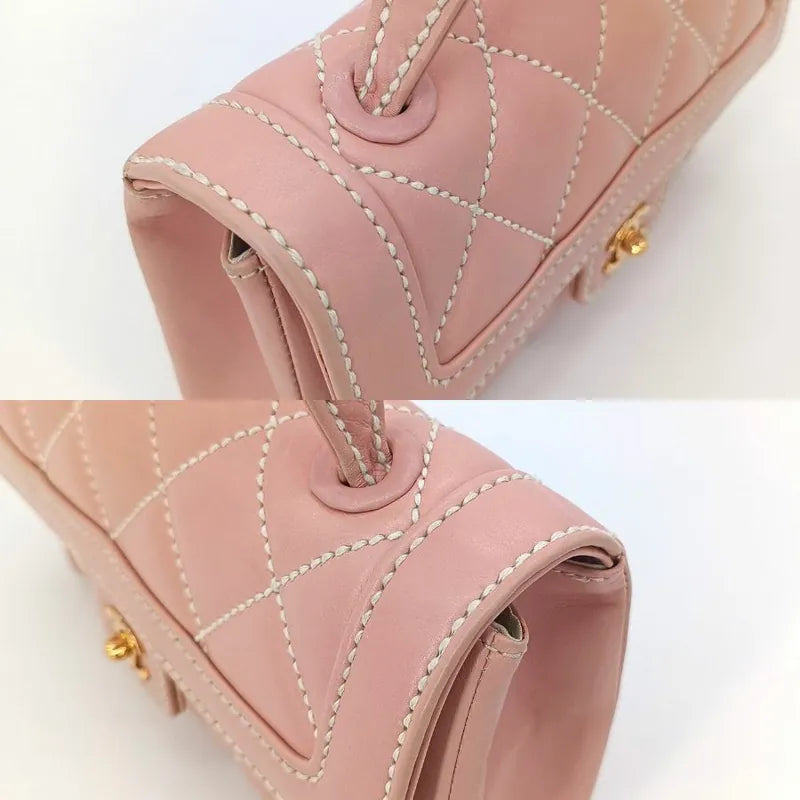 js496-chanel-vintage-pink-calfskin-wild-stitch-handbag