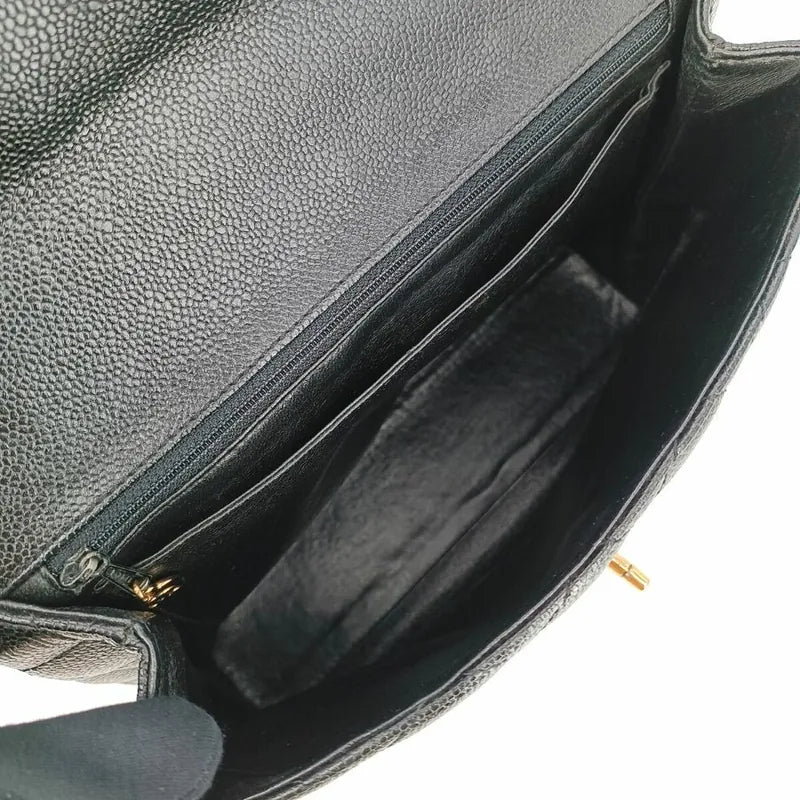 c401-chanel-vintage-black-caviar-leather-kelly-handbag