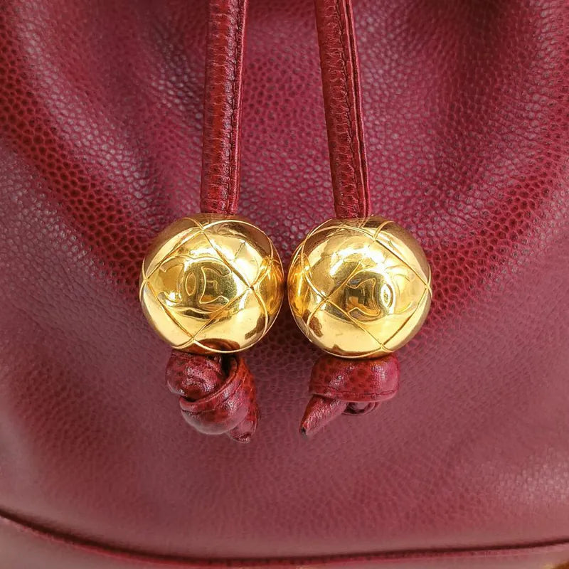 ra502-chanel-vintage-burgundy-caviar-leather-gold-ball-bucket-bag