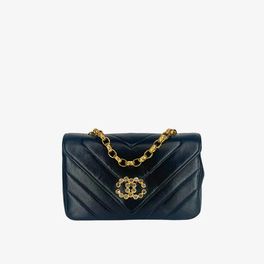 JZ511 - CHANEL Vintage Black Lambskin Chevron Gold Chain Flap Bag