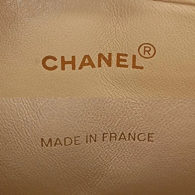 jt181-chanel-vintage-beige-lambskin-tassel-camera-bag