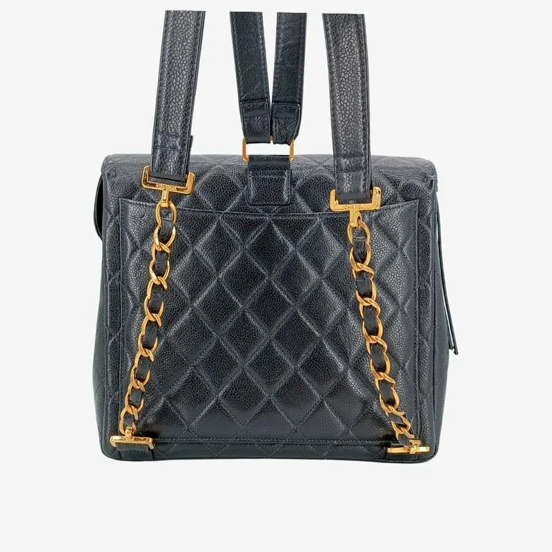 90179080-chanel-vintage-navy-caviar-leather-square-flap-backpack