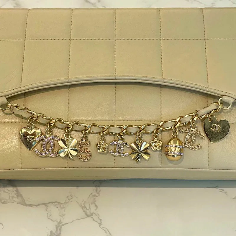 c538-chanel-vintage-beige-lambskin-chocolate-bar-charms-flap-bag