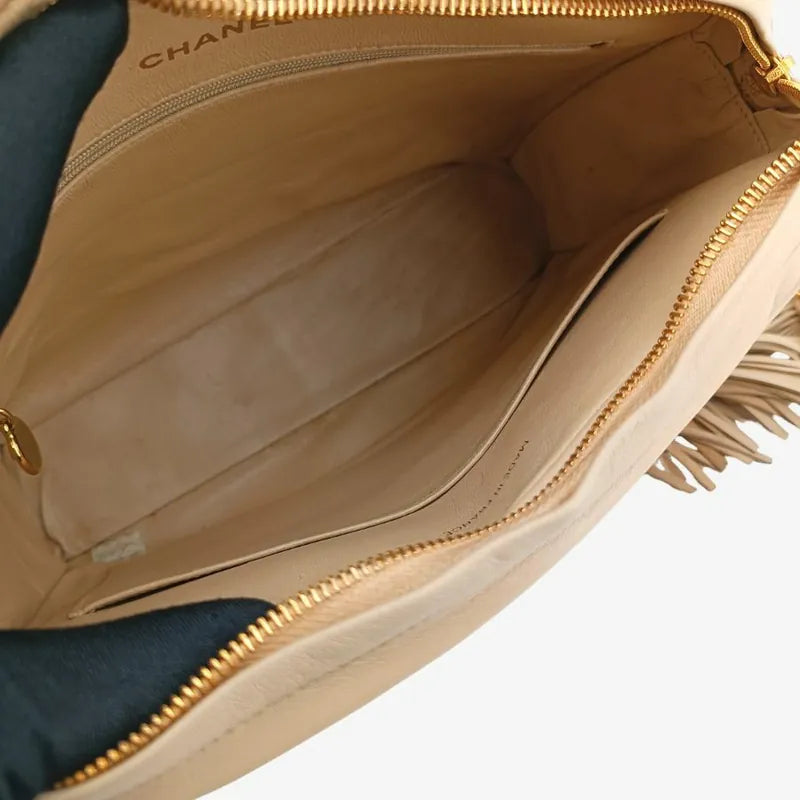 jah126-chanel-vintage-beige-lambskin-tassel-camera-bag