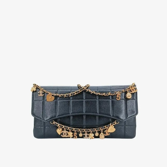 90188566-chanel-black-lambskin-chocolate-bar-charms-flap-bag