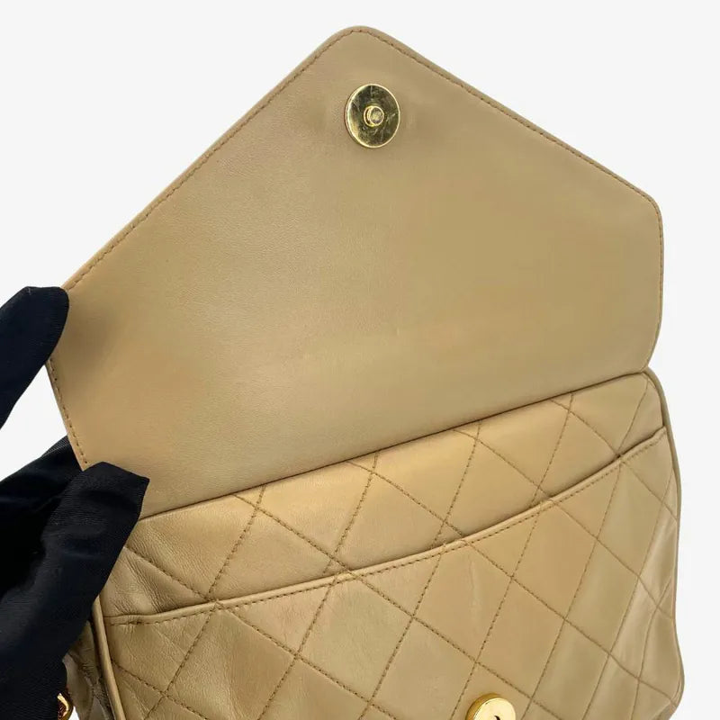 jw564-chanel-vintage-beige-lambskin-tassel-camera-bag