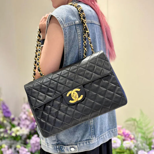 C638 - CHANEL Vintage Black Lambskin Jumbo Maxi Classic Flap Bag