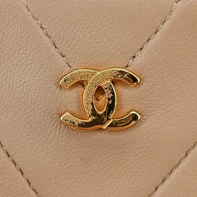rb447-chanel-vintage-beige-lambskin-chevron-handbag