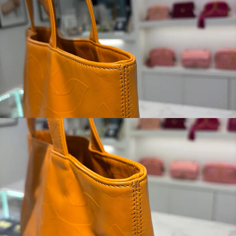 jw563-chanel-vintage-mustard-lambskin-cc-embossed-tote-bag