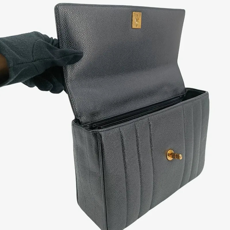 c361-chanel-vintage-black-caviar-leather-vertical-flap-handbag