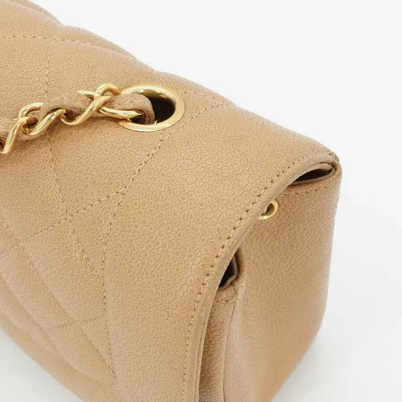 jah44-chanel-vintage-beige-caviar-25cm-diana-flap-bag