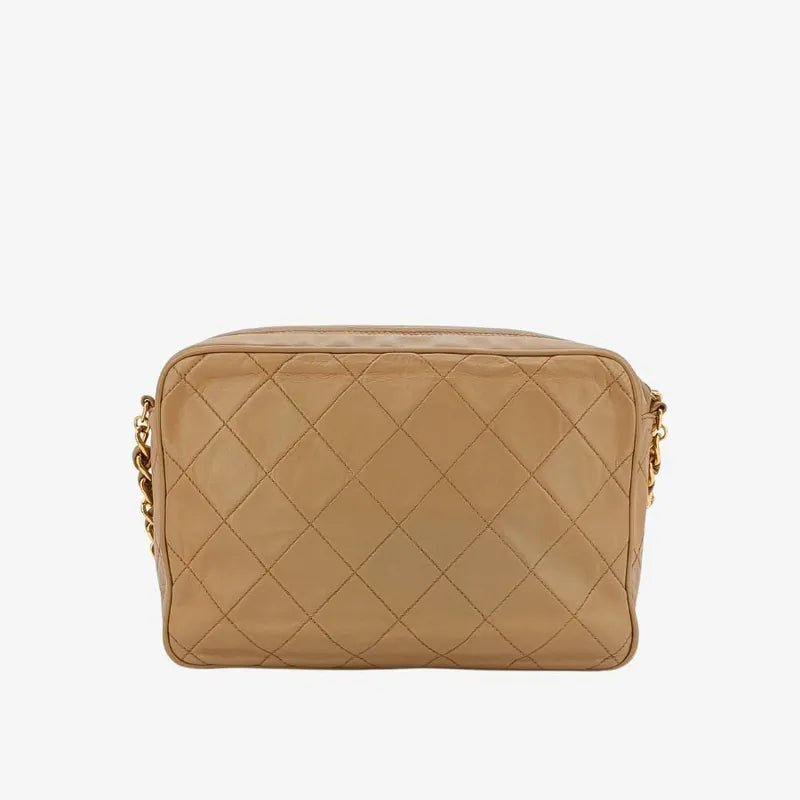 jah173-chanel-vintage-beige-lambskin-tassel-camera-bag