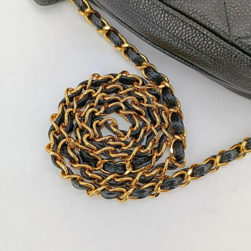 ju213-chanel-vintage-black-caviar-leather-quilted-camera-bag