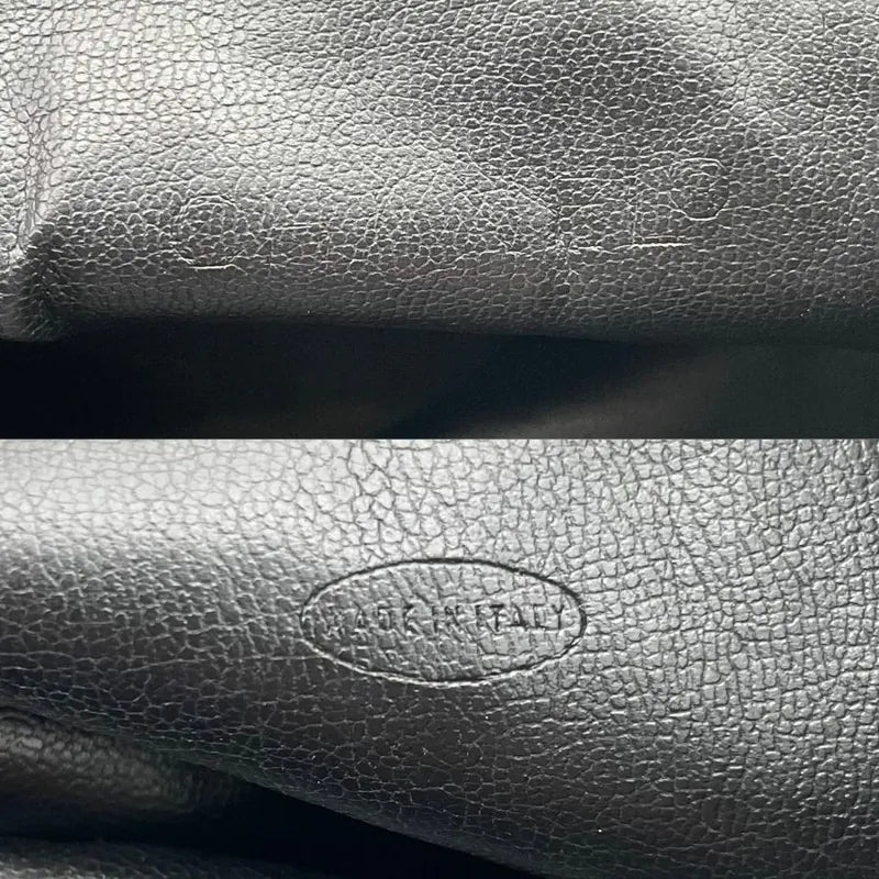 jw571-chanel-vintage-black-lambskin-drawstring-backpack