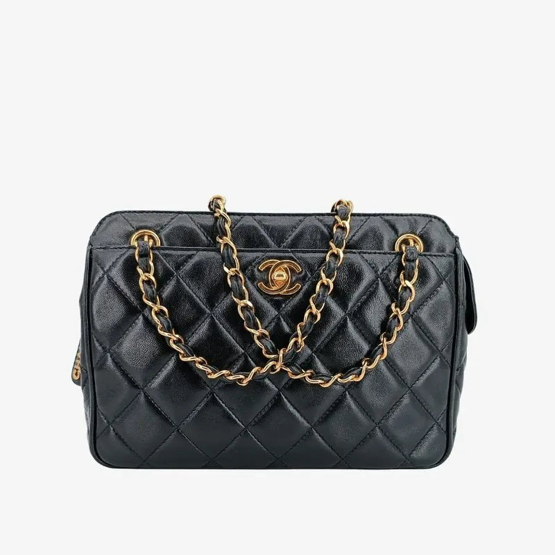 js718-chanel-vintage-black-lambskin-quilted-camera-bag