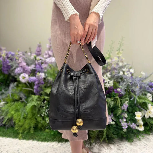 C614 - CHANEL Vintage Black Lambskin Gold Ball Bucket Bag