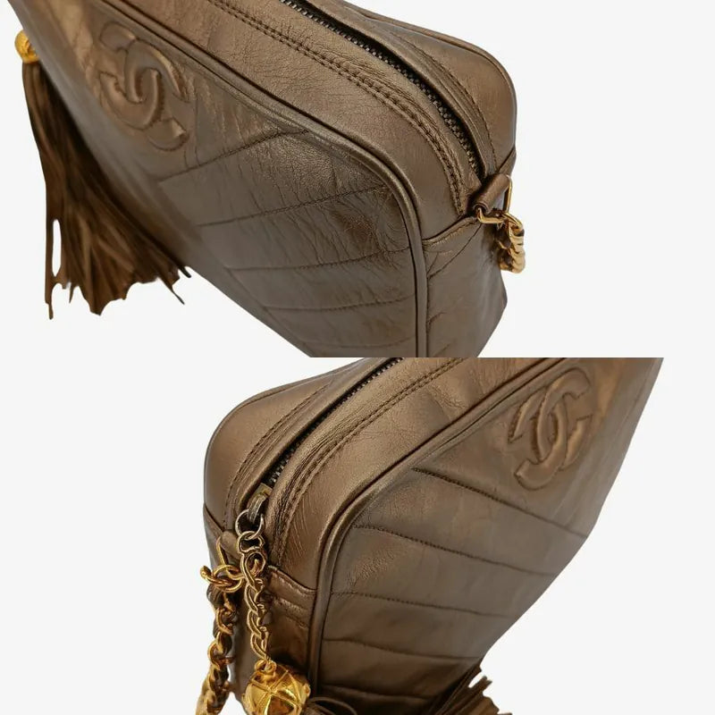 jah153-chanel-vintage-gold-lambskin-tassel-cross-stripe-camera-bag