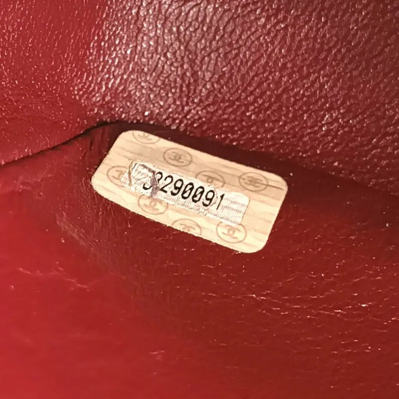 c407-chanel-vintage-navy-lambskin-chevron-mini-flap-bag