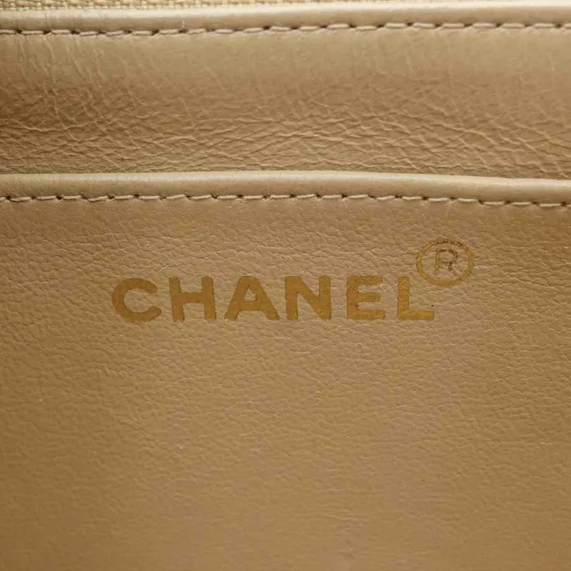 jah44-chanel-vintage-beige-caviar-25cm-diana-flap-bag