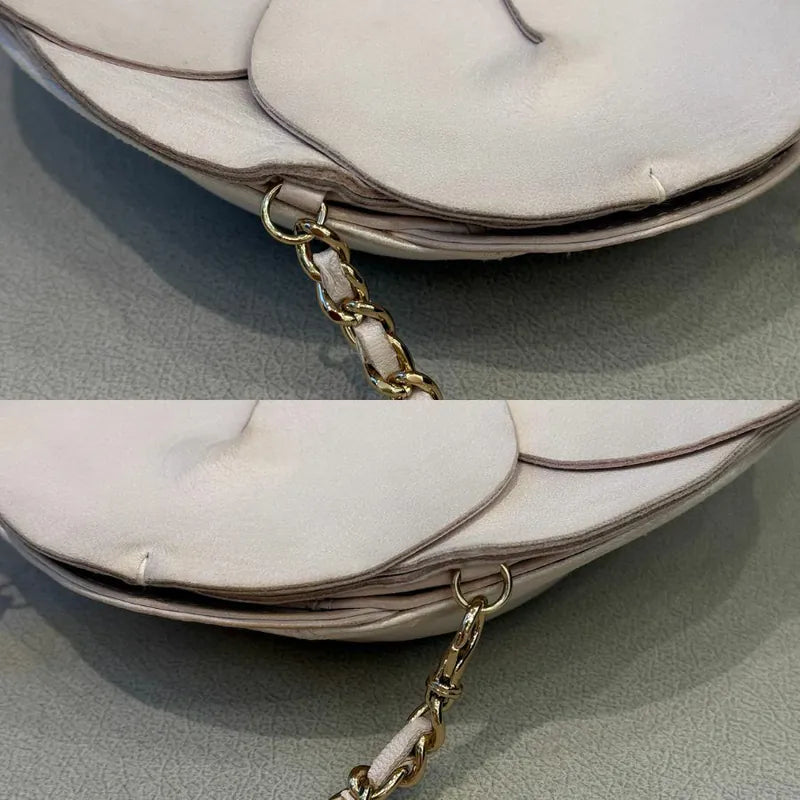 c531-chanel-vintage-pale-pink-calfskin-camellia-wristlet-evening-bag