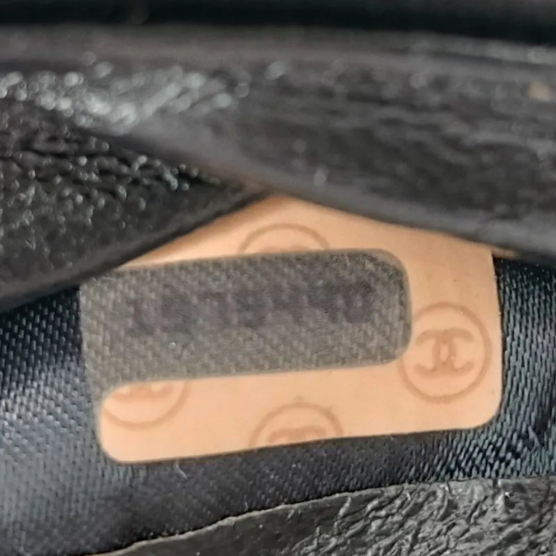 ra253-chanel-vintage-black-lambskin-tassel-bucket-bag