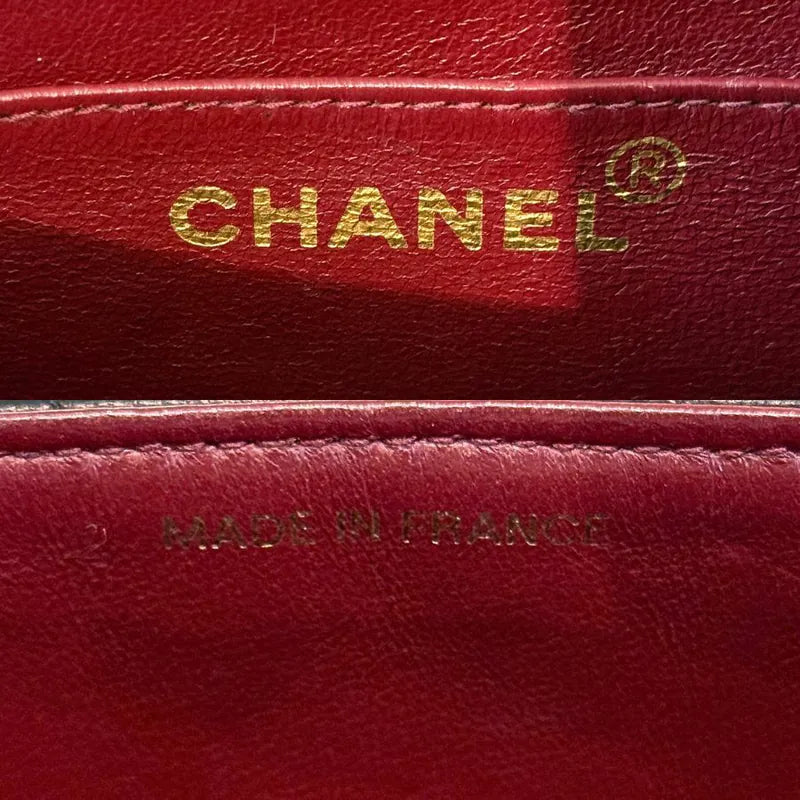 rc769-chanel-vintage-black-lambskin-vertical-gold-chain-flap-bag