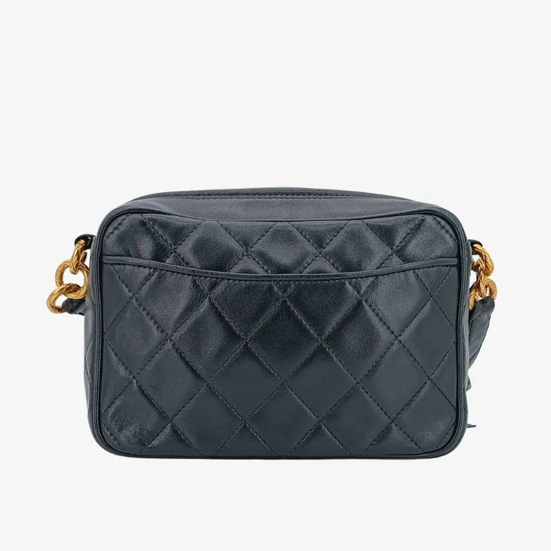 js491-chanel-vintage-black-lambskin-quilted-tassels-camera-bag