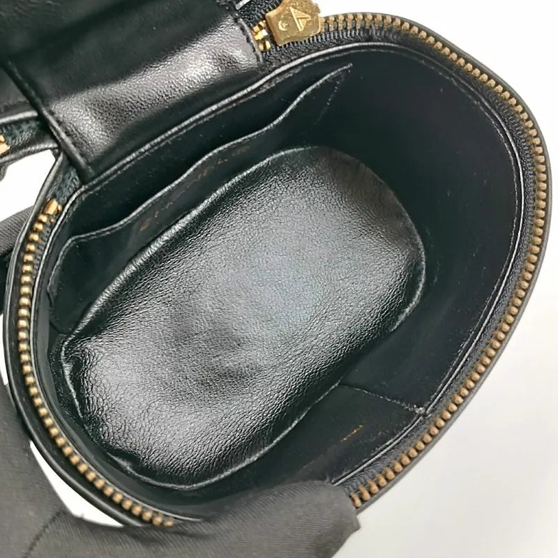 ra253-chanel-vintage-black-lambskin-tassel-bucket-bag
