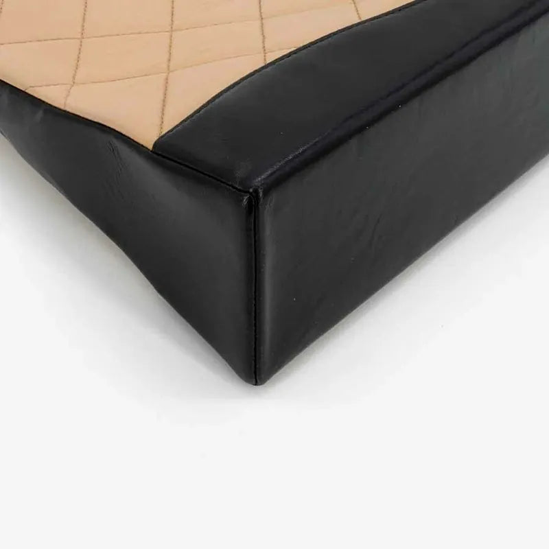 jr503-chanel-vintage-beige-and-black-lambskin-quilted-shopping-bag