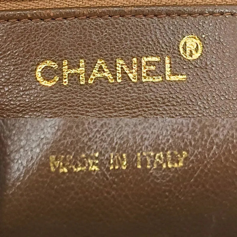 ju350-chanel-vintage-beige-lambskin-tassel-camera-bag