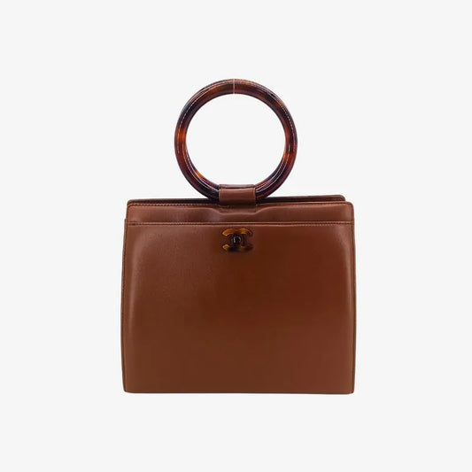90234616-chanel-vintage-brown-lambskin-tortoiseshell-handbag