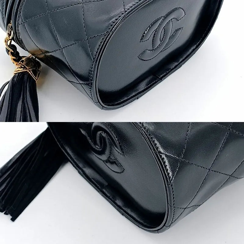 c302-chanel-vintage-black-lambskin-tassel-bucket-bag
