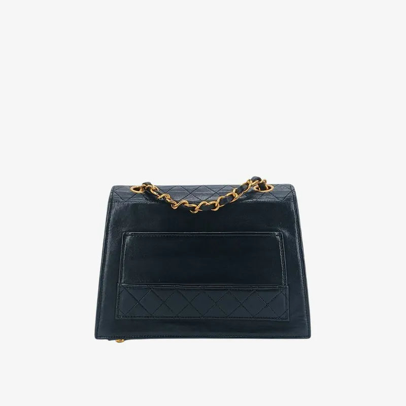ju308-chanel-vintage-black-lambskin-trapezoid-flap-bag