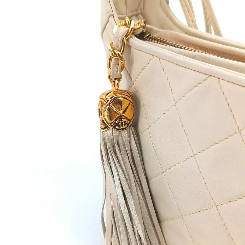 jah165-chanel-vintage-beige-lambskin-quilted-camera-bag