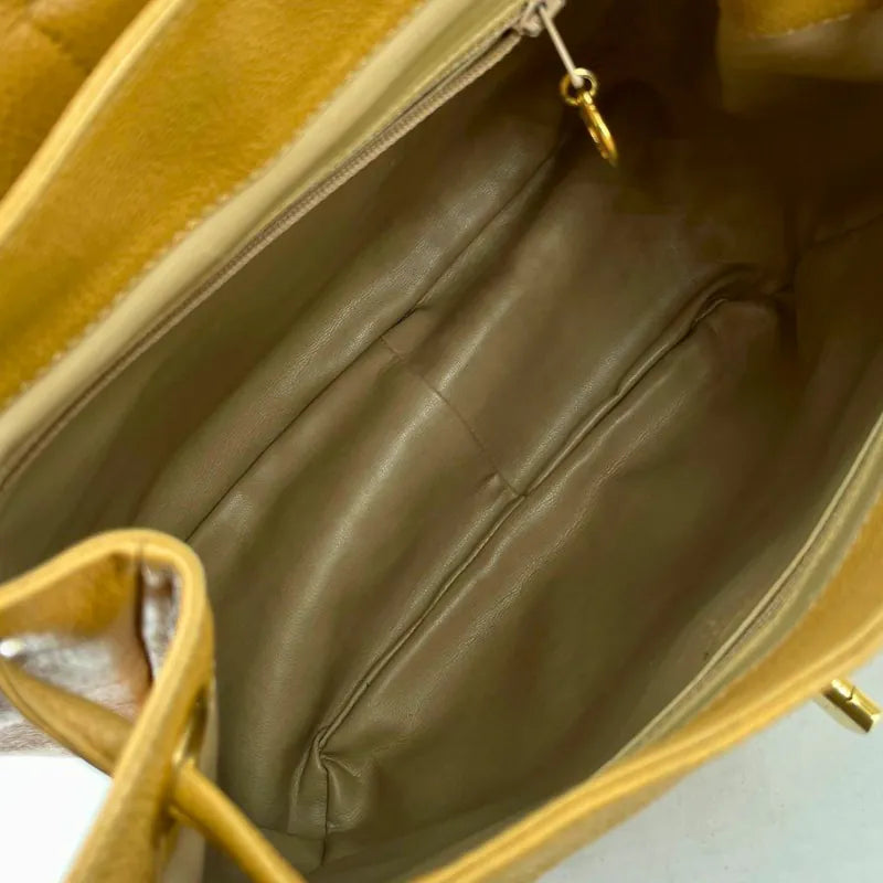 rc295-chanel-vintage-beige-caviar-leather-turnlock-flap-backpack