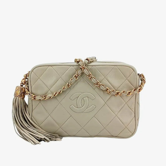 ra968-chanel-vintage-beige-lambskin-tassel-camera-bag