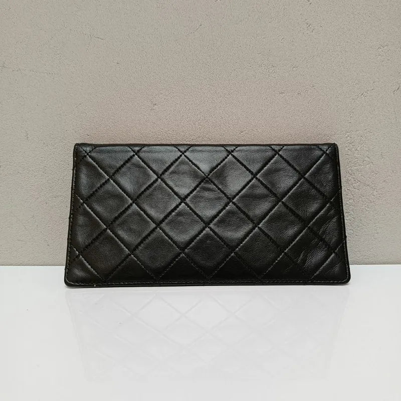 jx099-chanel-vintage-black-lambskin-pouch