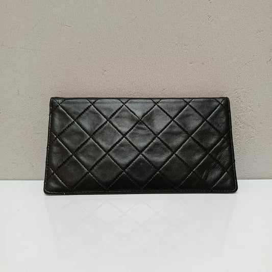jx099-chanel-vintage-black-lambskin-pouch