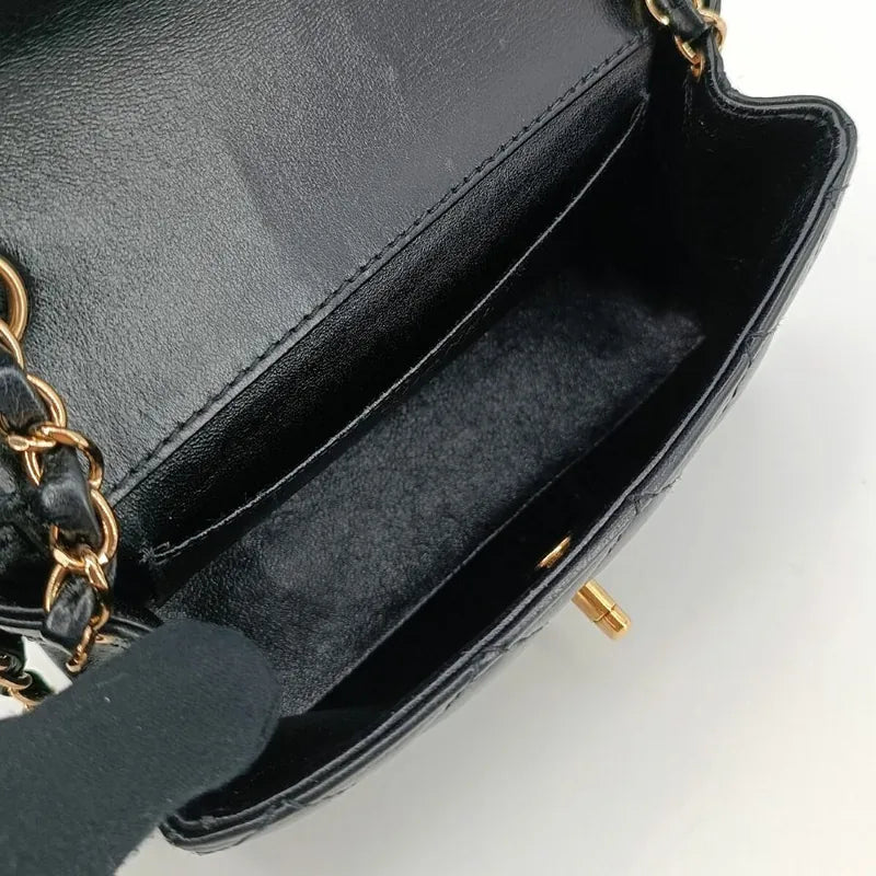 jah77-chanel-vintage-black-lambskin-flap-bag