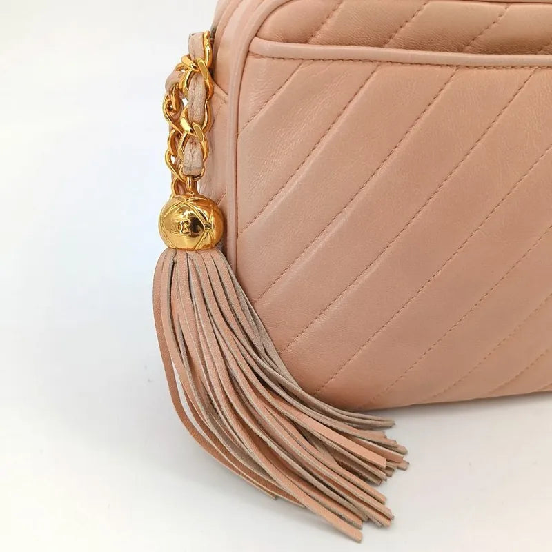 ra349-chanel-vintage-pink-lambskin-tessel-camera-bag
